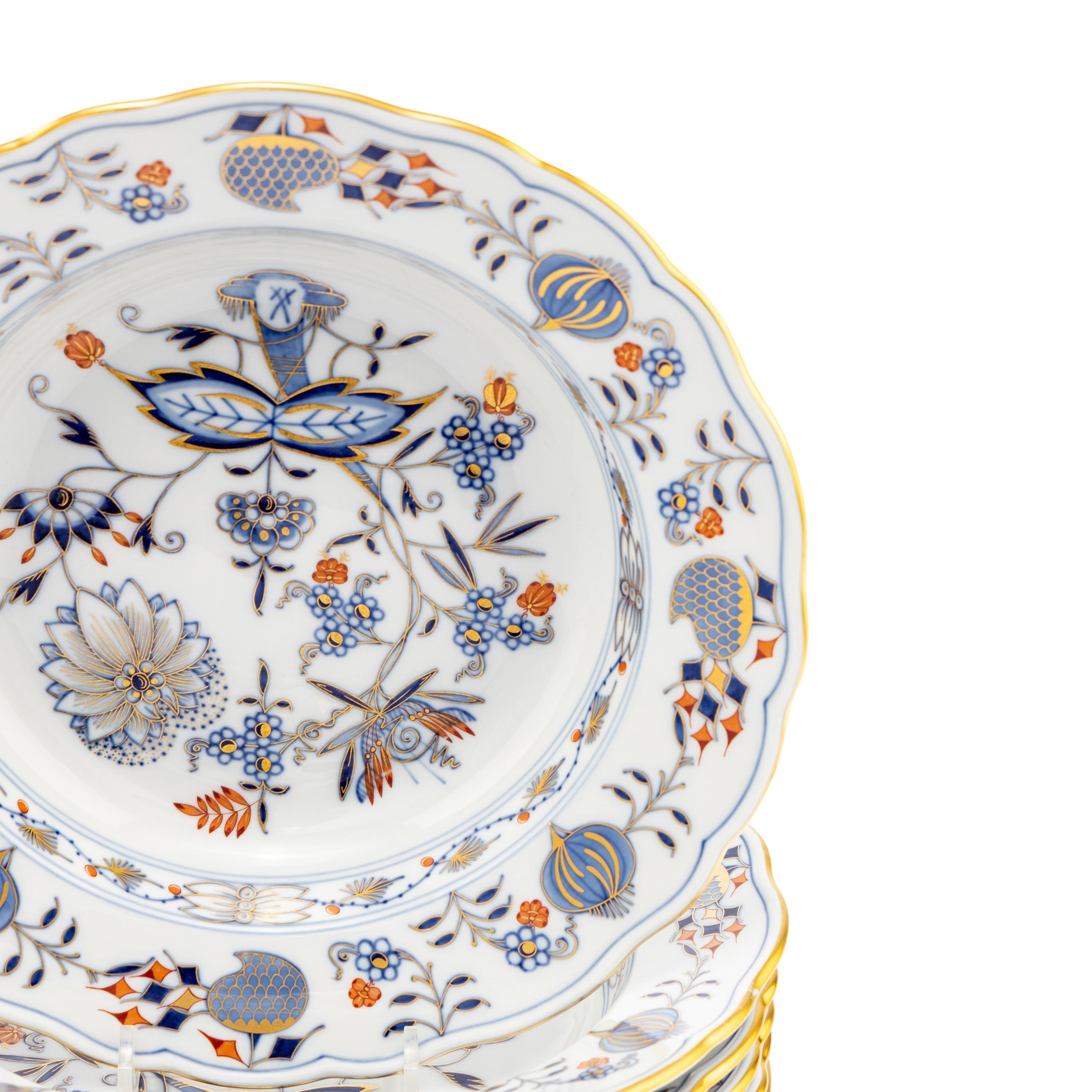 A Set of Twelve Meissen Parcel Gilt Blue Onion Porcelain Soup Plates