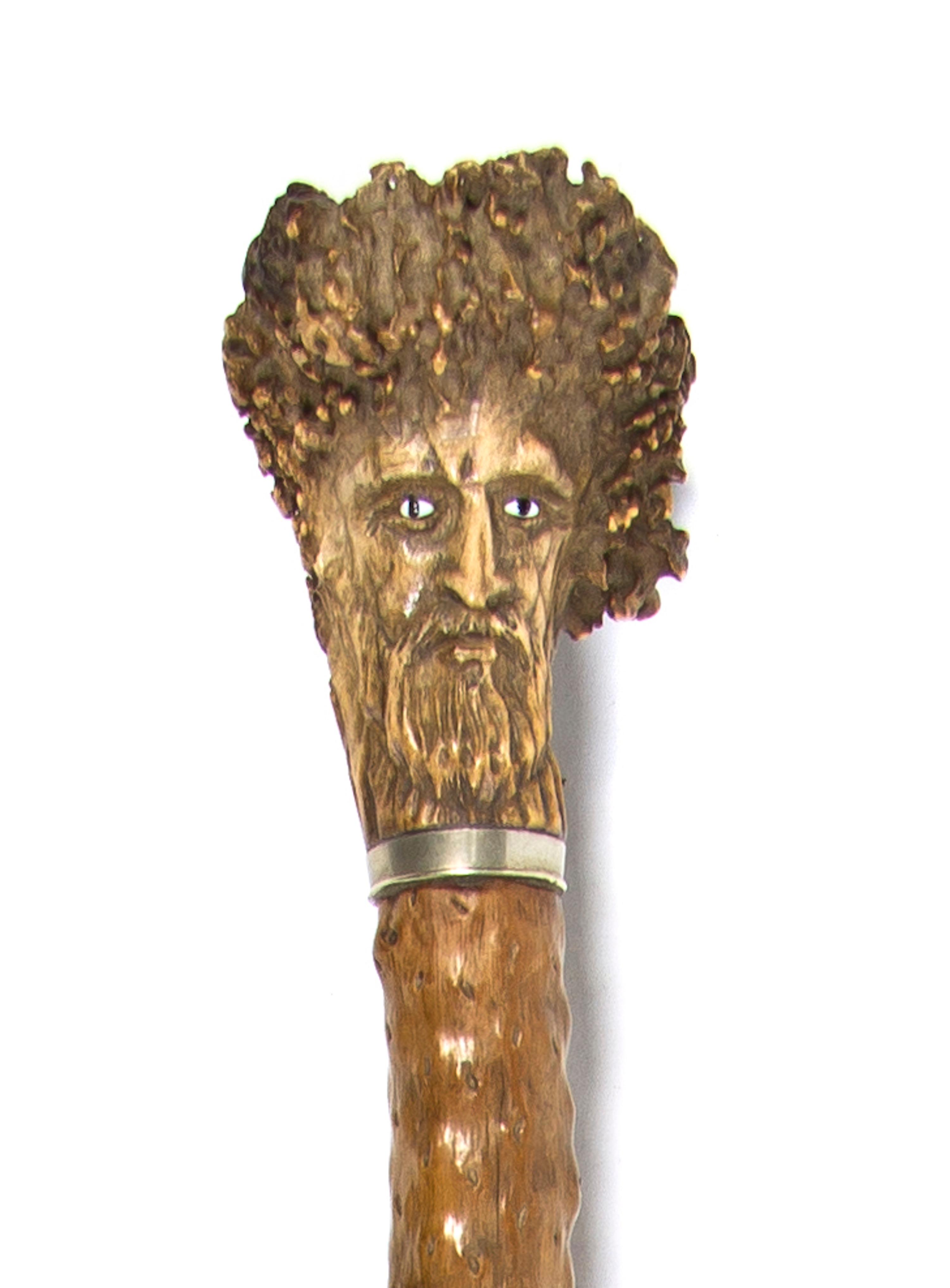 An Ivory Inset Carved Antler Walking Stick, Height overall 34 3/4 inches.