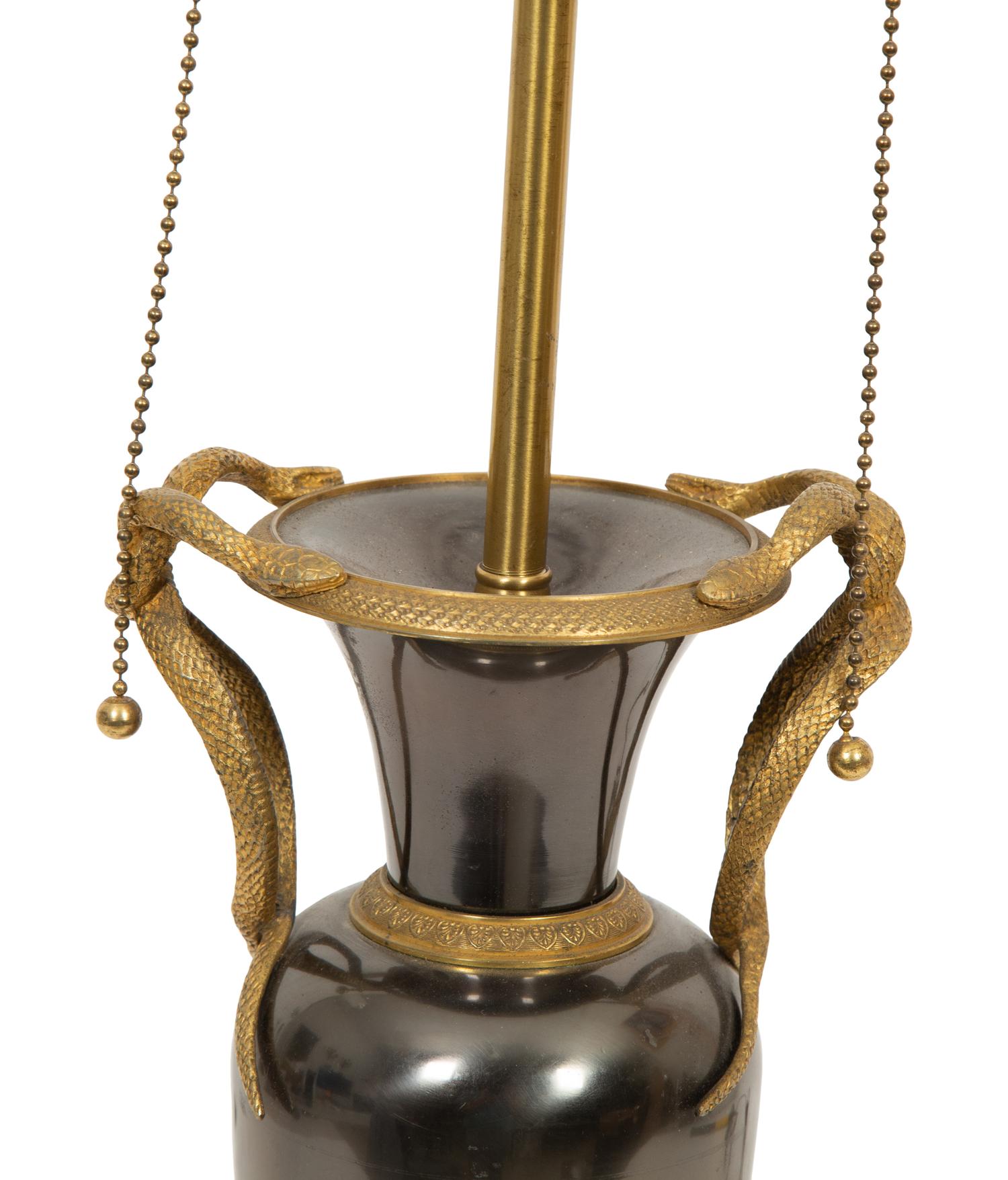 A Gilt Bronze and Silver Metal Urn Mounted as a Lamp