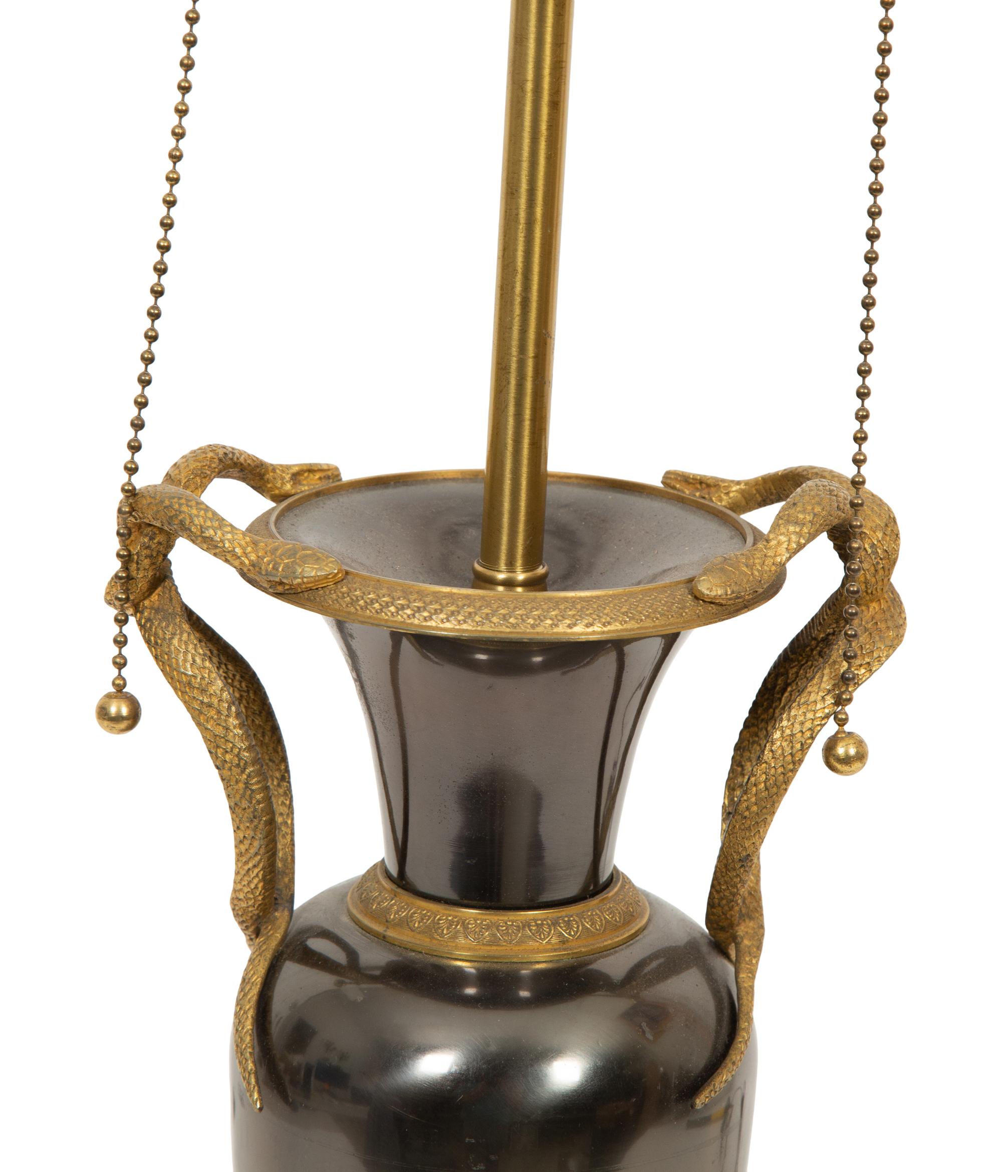 A Gilt Bronze and Silver Metal Urn Mounted as a Lamp