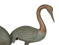 A Bronze Sculpture of Four Standing Cranes