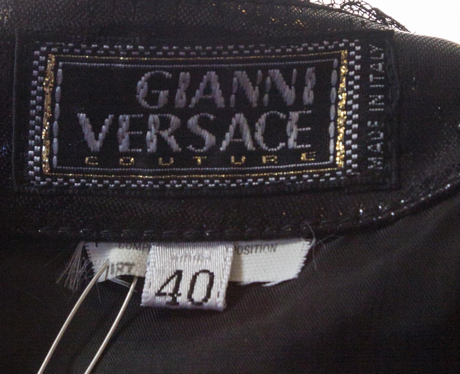 A Gianni Versace Black Lace Skirt Ensemble, Skirt size 40, blouse size 44.