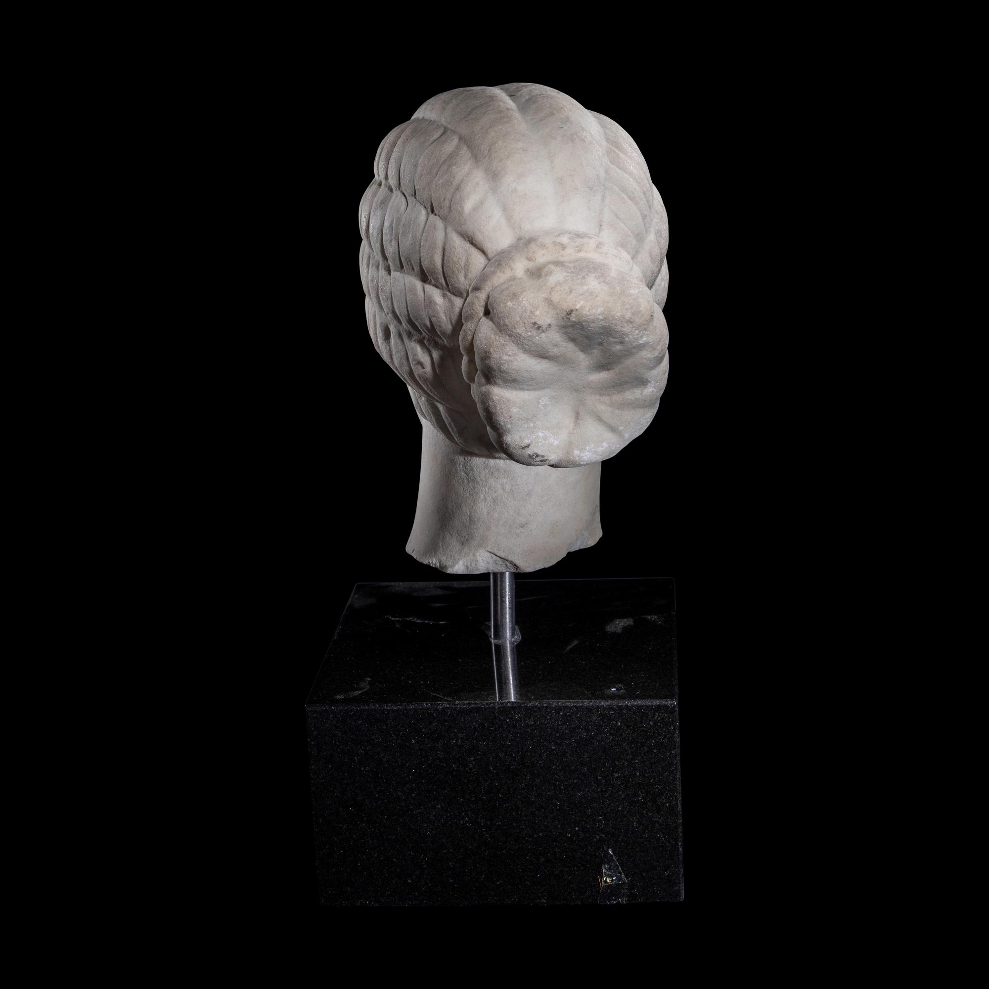 A Roman Marble Female Portrait Head