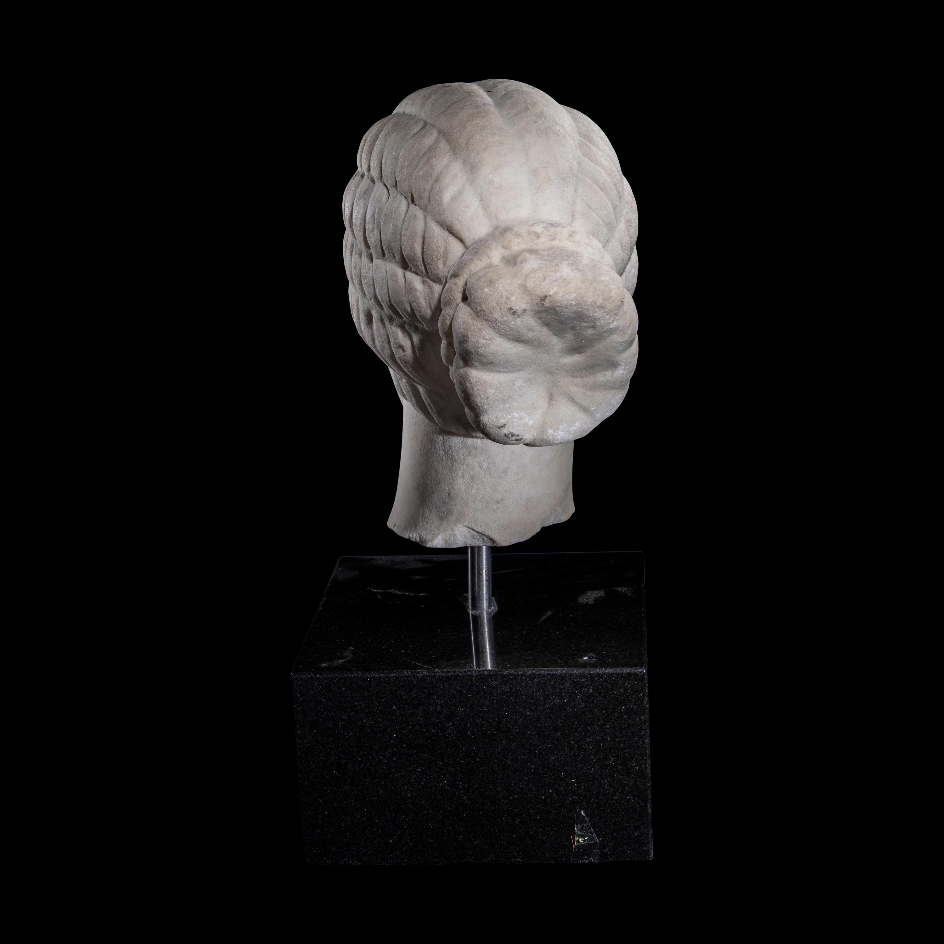 A Roman Marble Female Portrait Head