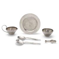 Pair of 'Lap-Over-Edge' Japanesque sterling silver serving spoons Tiffany & Co., New York, NY, circa 1880