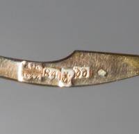 A Set of Six Niello Silver-Gilt Teaspoons, Mark of S. Stroganov, assay mark of Andrey Kovalsky, Moscow, 1846, each having a spherical f