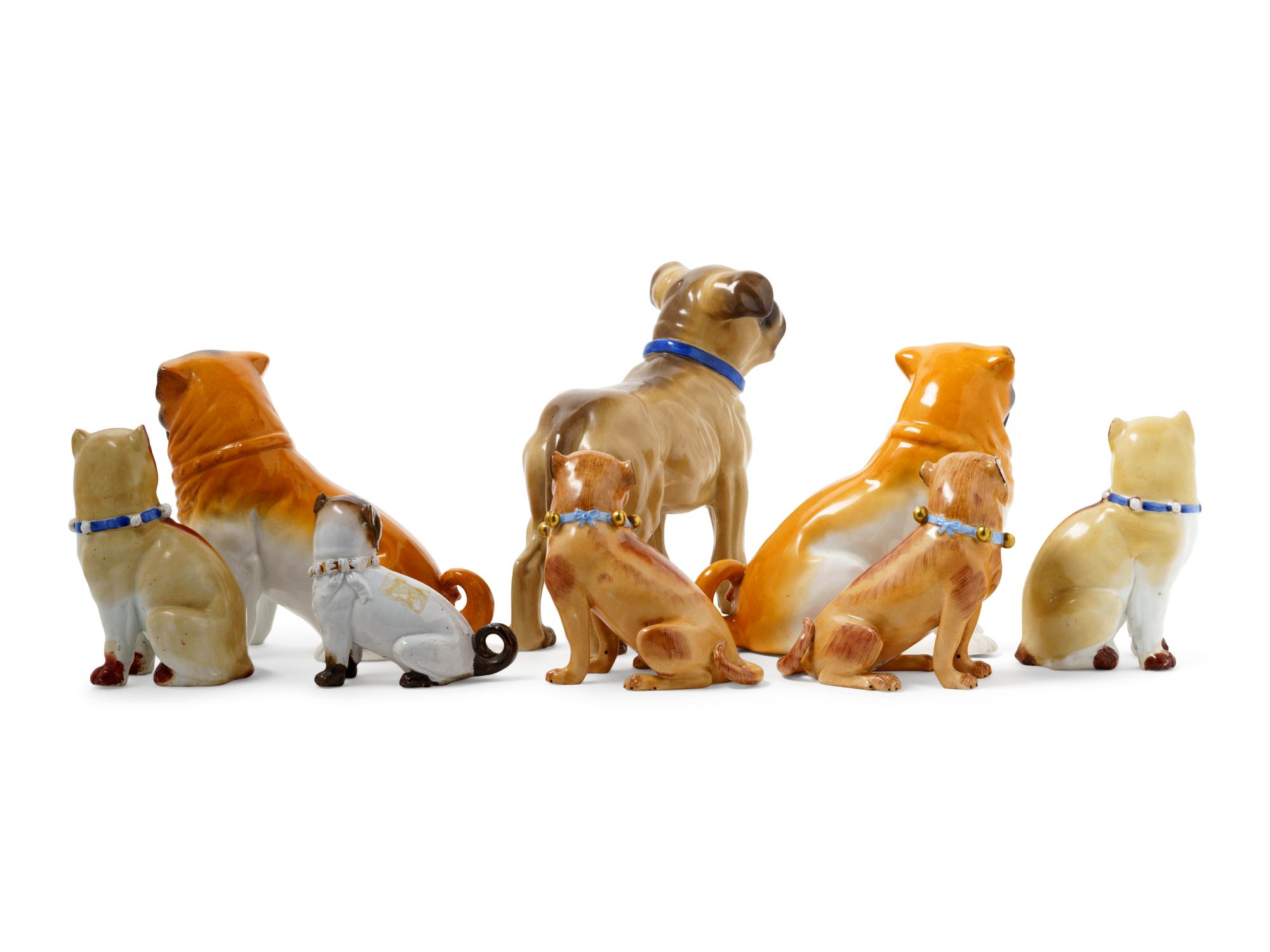 Eight Porcelain Pug Figures