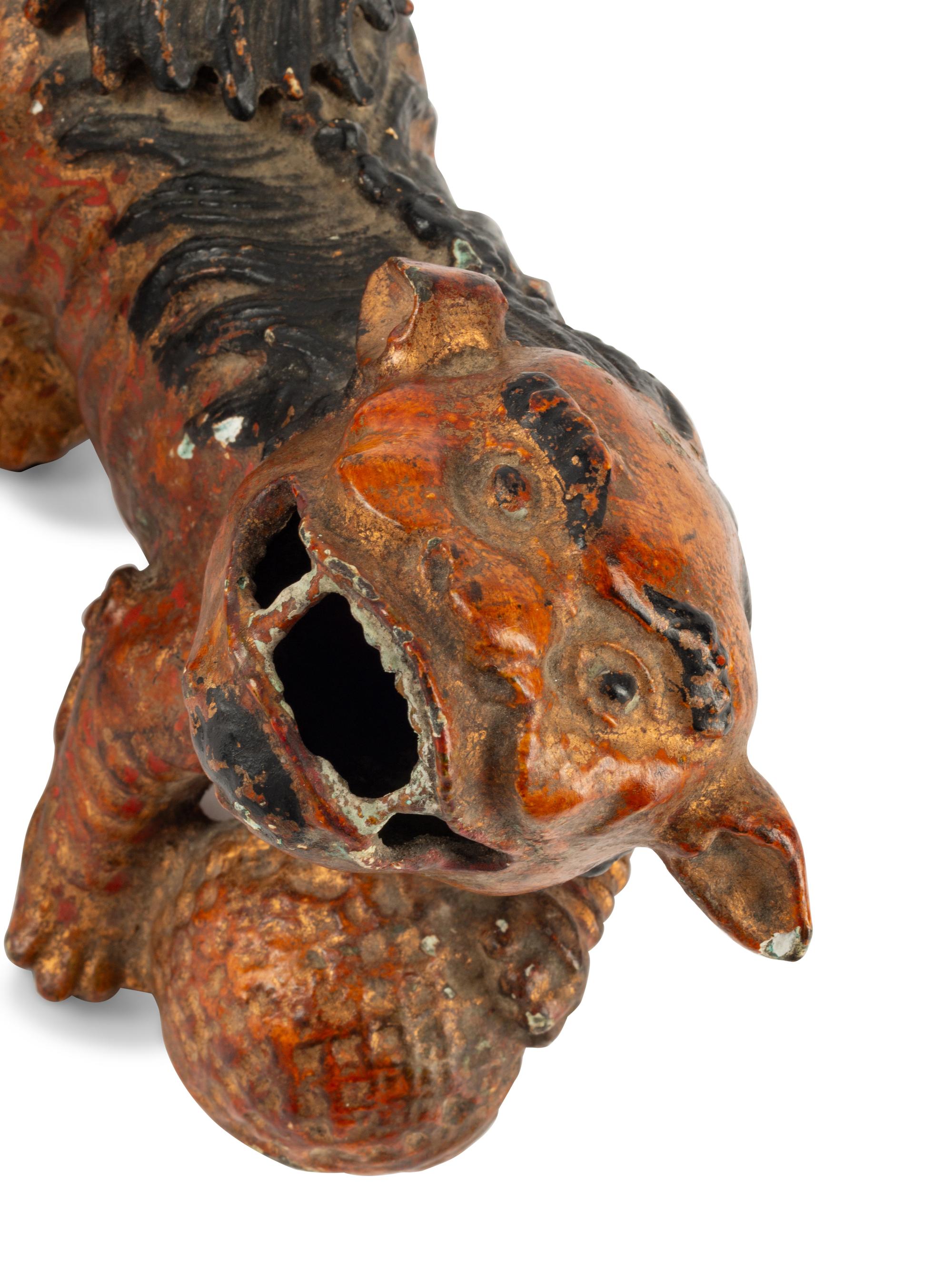 A Pair of Chinese Cold-Painted Cast Metal Models of Temple Guardians