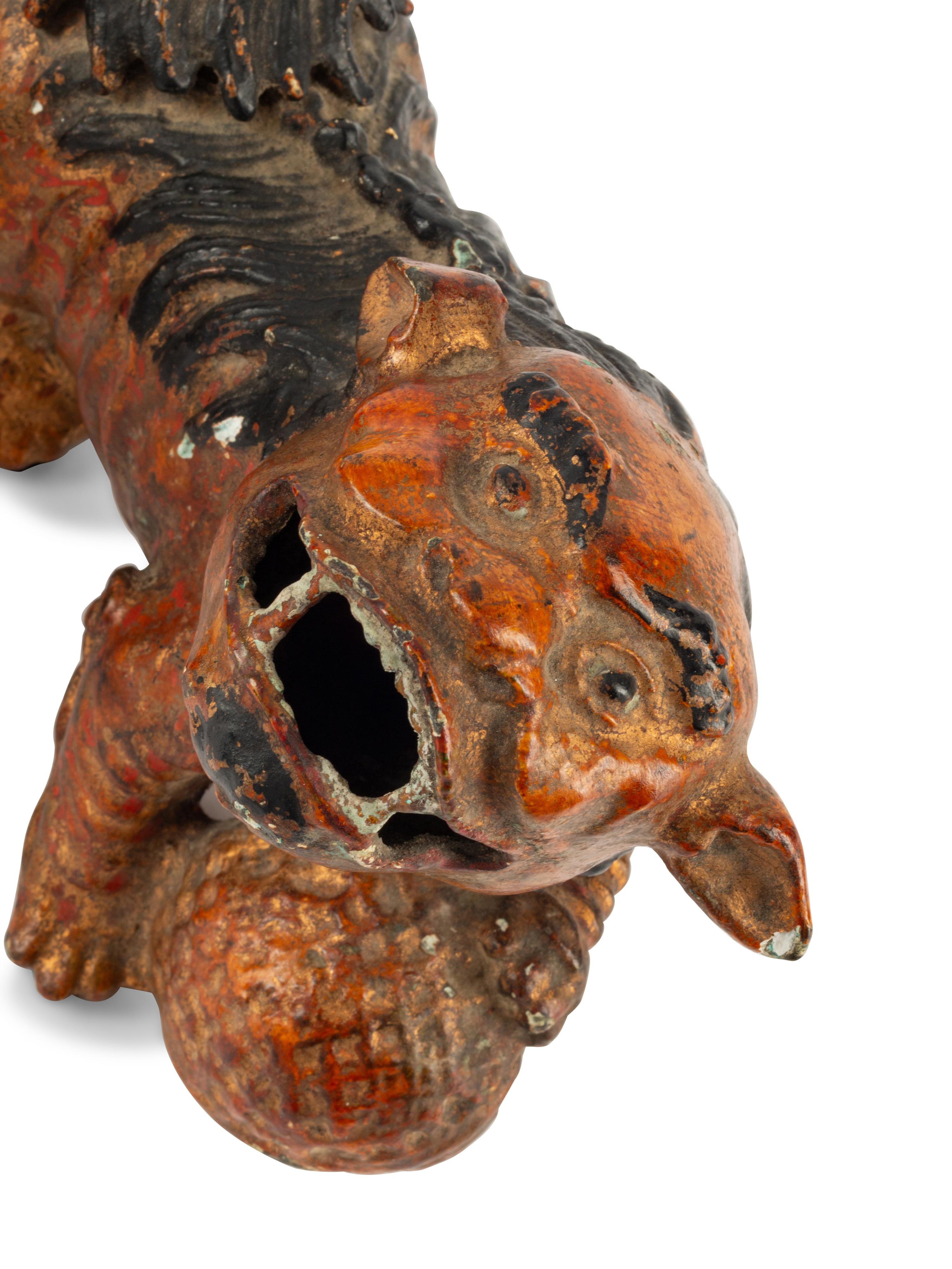 A Pair of Chinese Cold-Painted Cast Metal Models of Temple Guardians