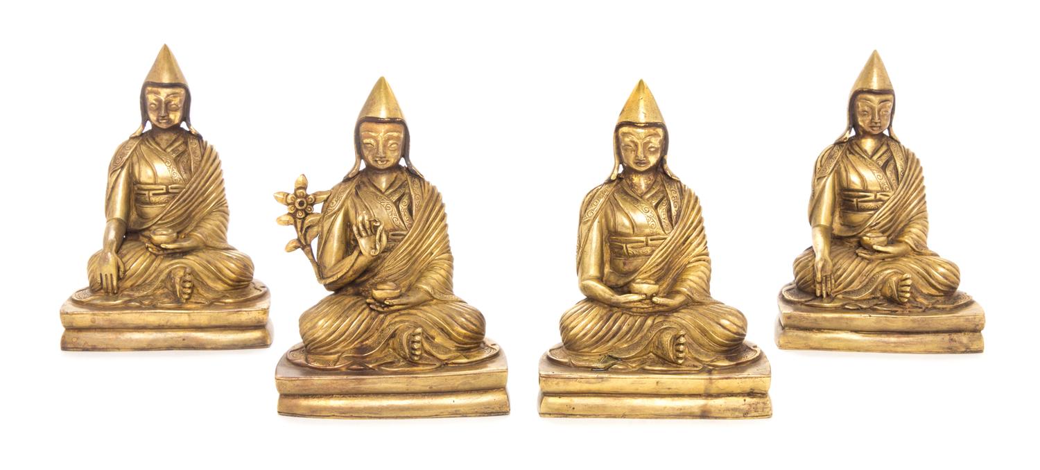 A Set of Four Sino-Tibetan Gilt Bronze Figures of Gelugpa Lamas — 19TH CENTURY