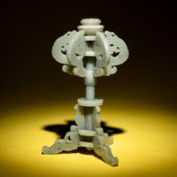 A Chinese Celadon Jade Hat Stand, 19th Century — 清晚期 青玉鏤雕夔龍紋冠架
