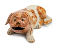 A Chinese Export Porcelain Figure of a Recumbent Dog — 19TH CENTURY