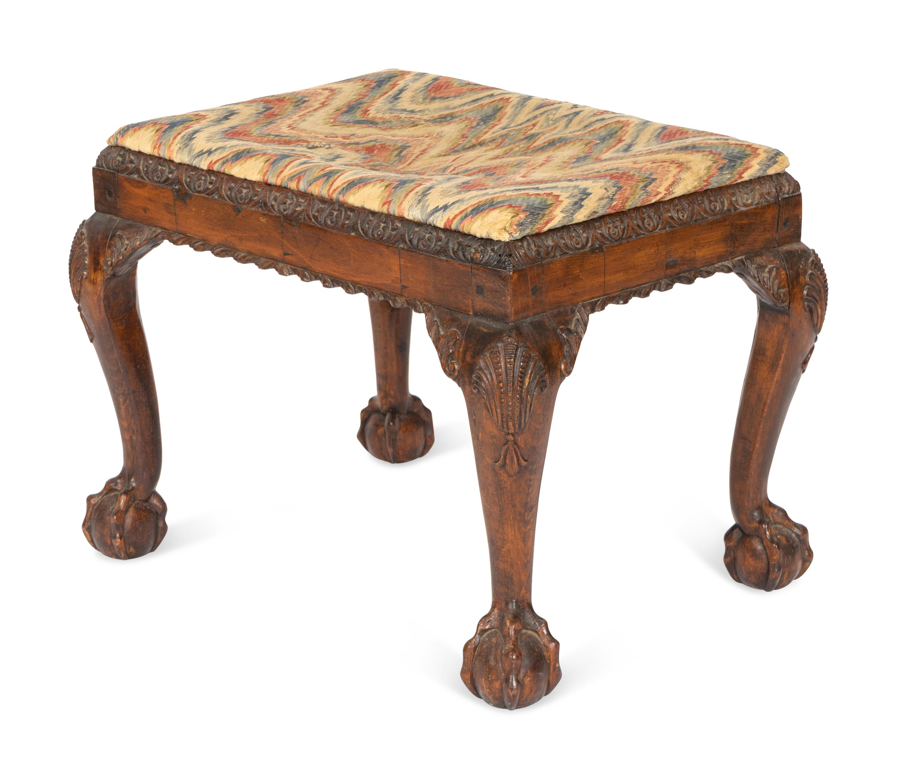 A George III Carved Walnut Footstool