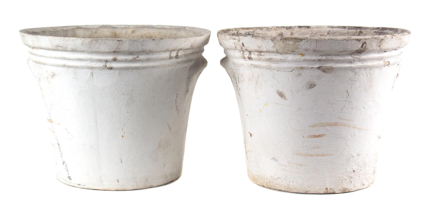 A Group of Five Concrete Planters Height of largest 17 inches x diameter 13 1/2 inches.