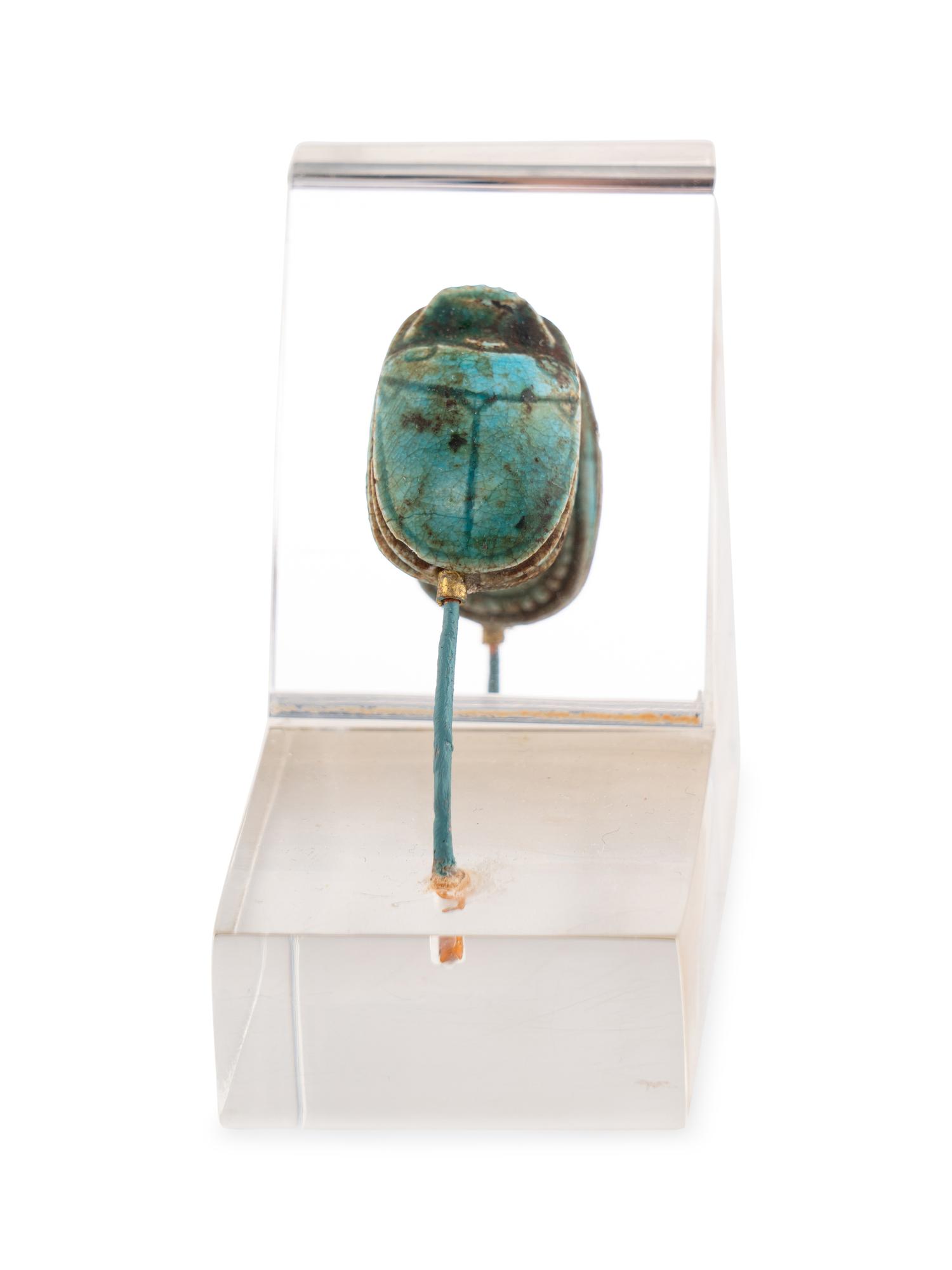 An Egyptian Faience Swivel Scarab