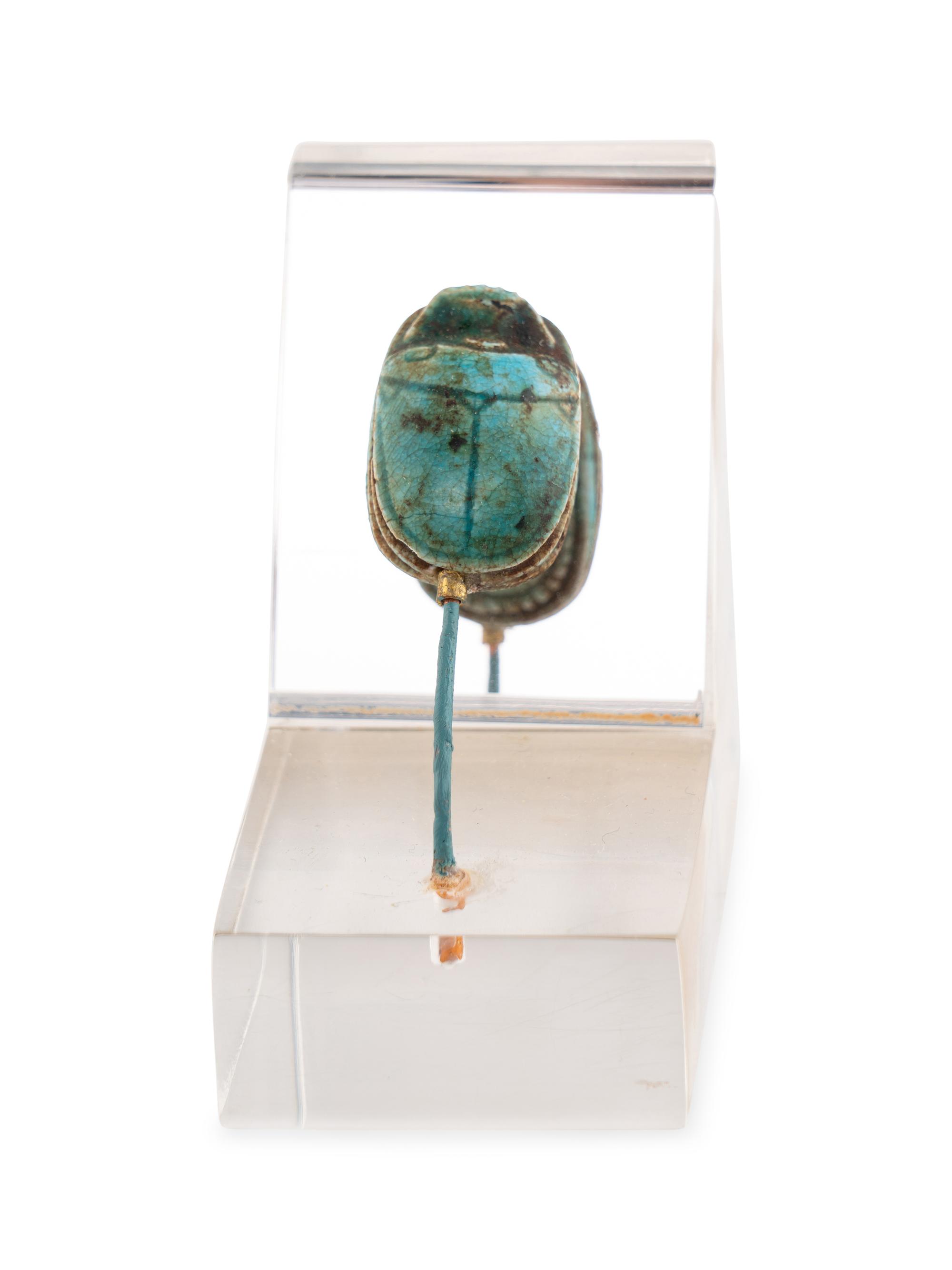 An Egyptian Faience Swivel Scarab