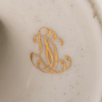 A French Parcel Gilt Porcelain Wine Cooler