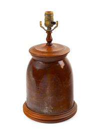 A Brown Glazed Stoneware Crock with a Later Crewel Work Shade