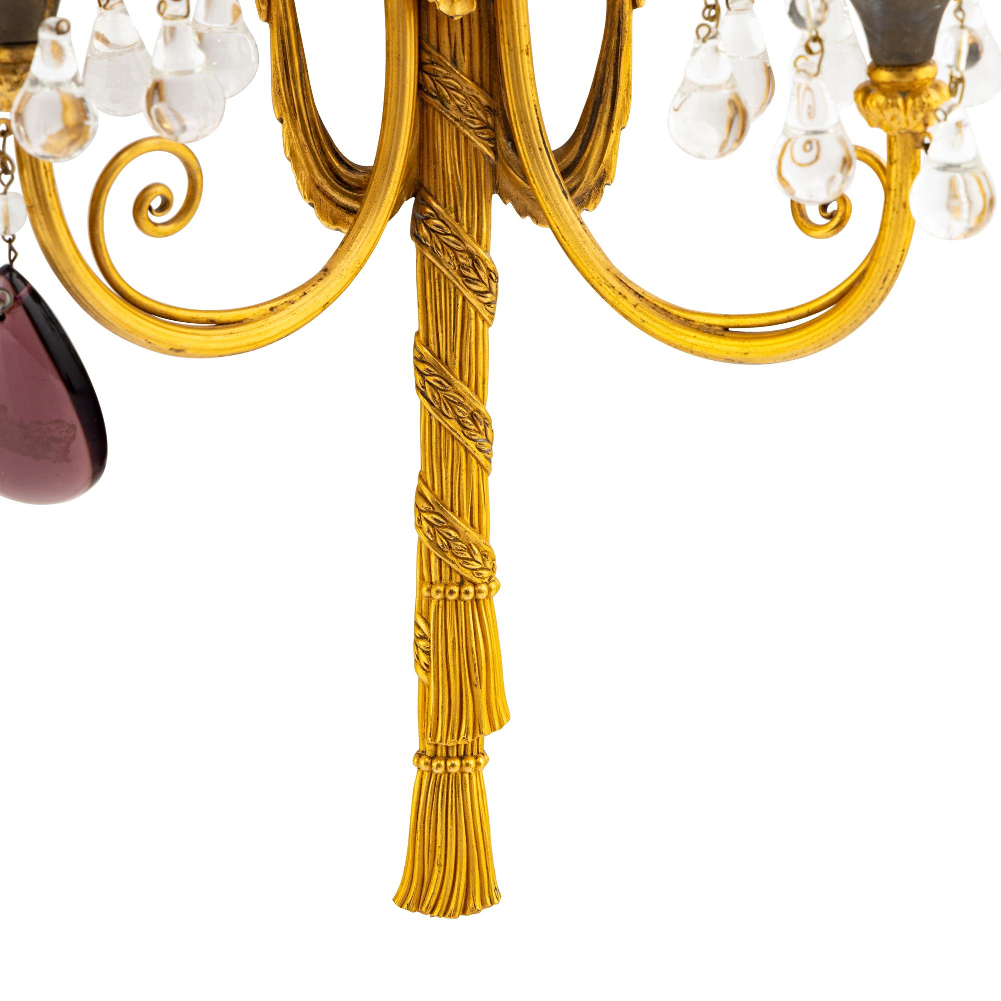 A Pair of French Gilt Bronze and Glass Two Light Sconces