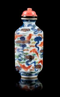 An Underglaze Blue and Enamelled Porcelain Snuff Bottle Height 2 7/8 inches. — JIAQING PERIOD (1796-1820)