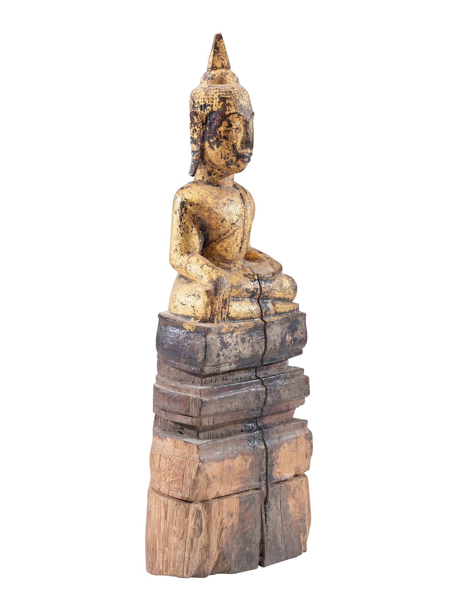 A Carved Giltwood Seated Buddha Figure