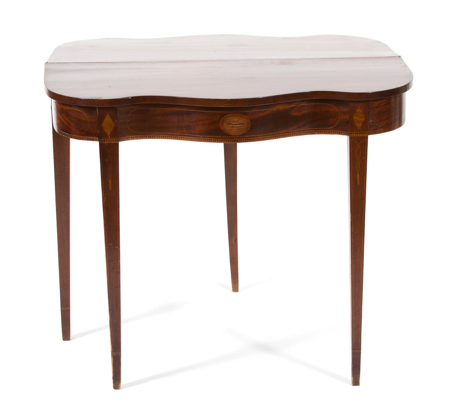 An American Federal Inlaid Mahogany Serpentine Flip-Top Table Height 30 x width 35 1/2 x depth 17 1/2 inches. — 19TH CENTURY