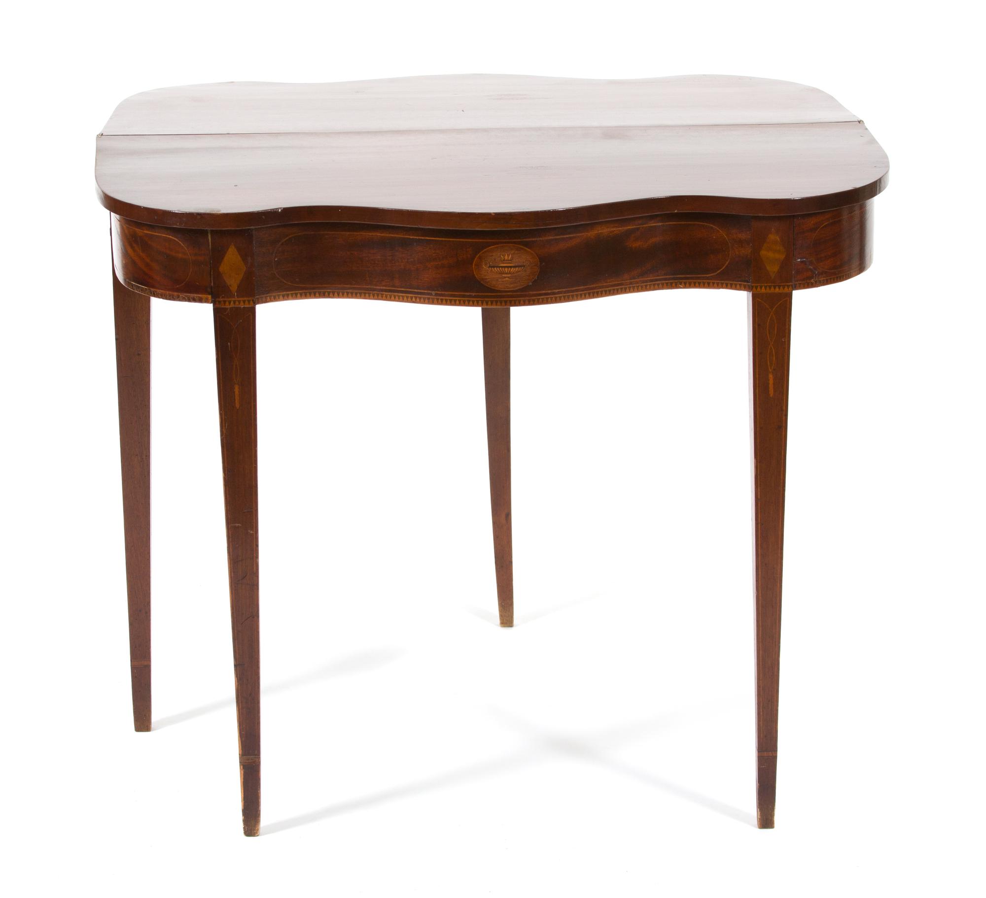 An American Federal Inlaid Mahogany Serpentine Flip-Top Table Height 30 x width 35 1/2 x depth 17 1/2 inches. — 19TH CENTURY
