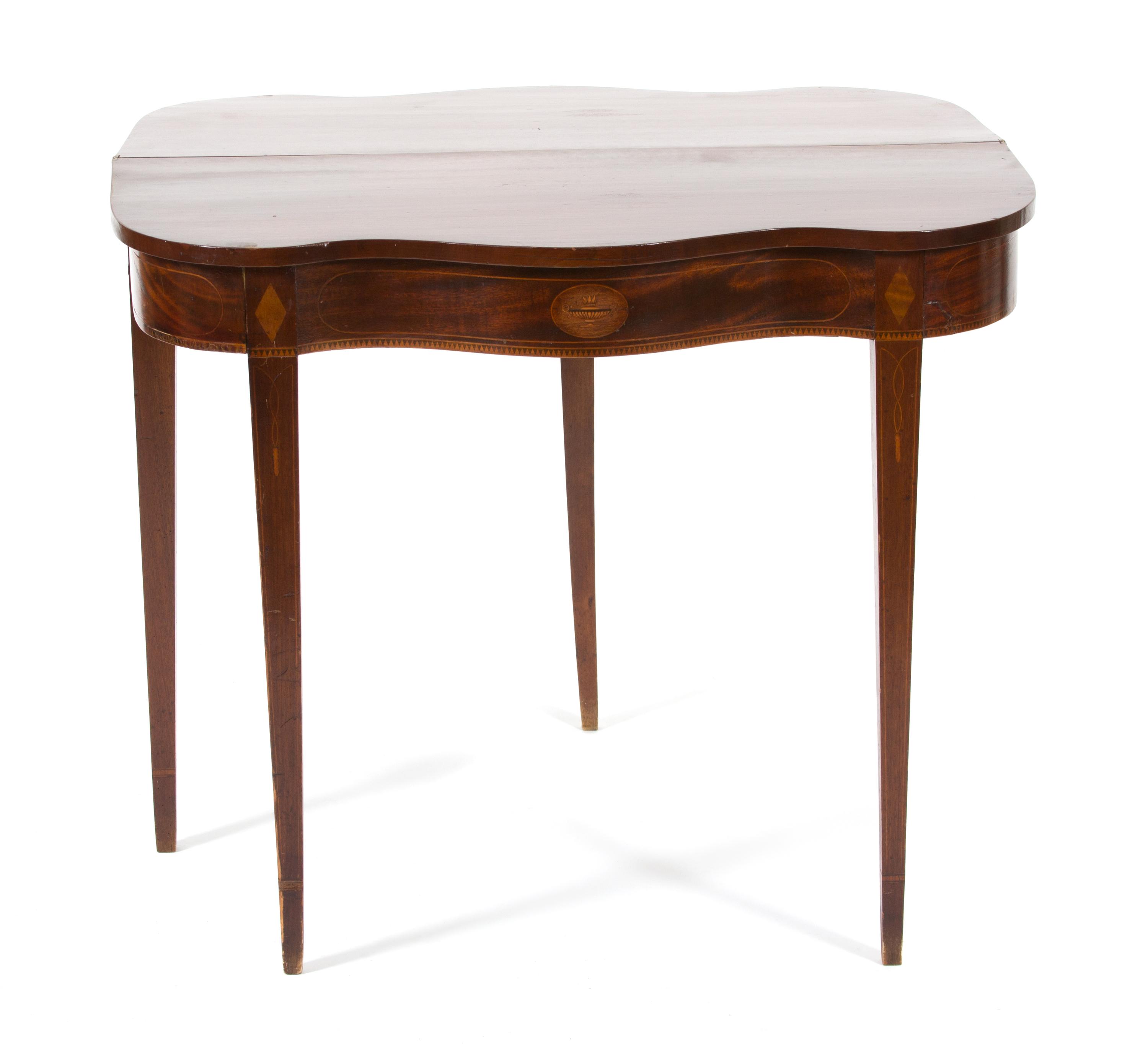 An American Federal Inlaid Mahogany Serpentine Flip-Top Table Height 30 x width 35 1/2 x depth 17 1/2 inches. — 19TH CENTURY