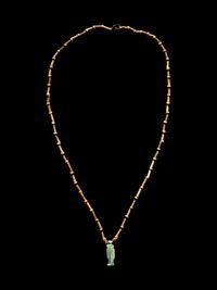 An Egyptian Bead and Faience Necklace with Khnum