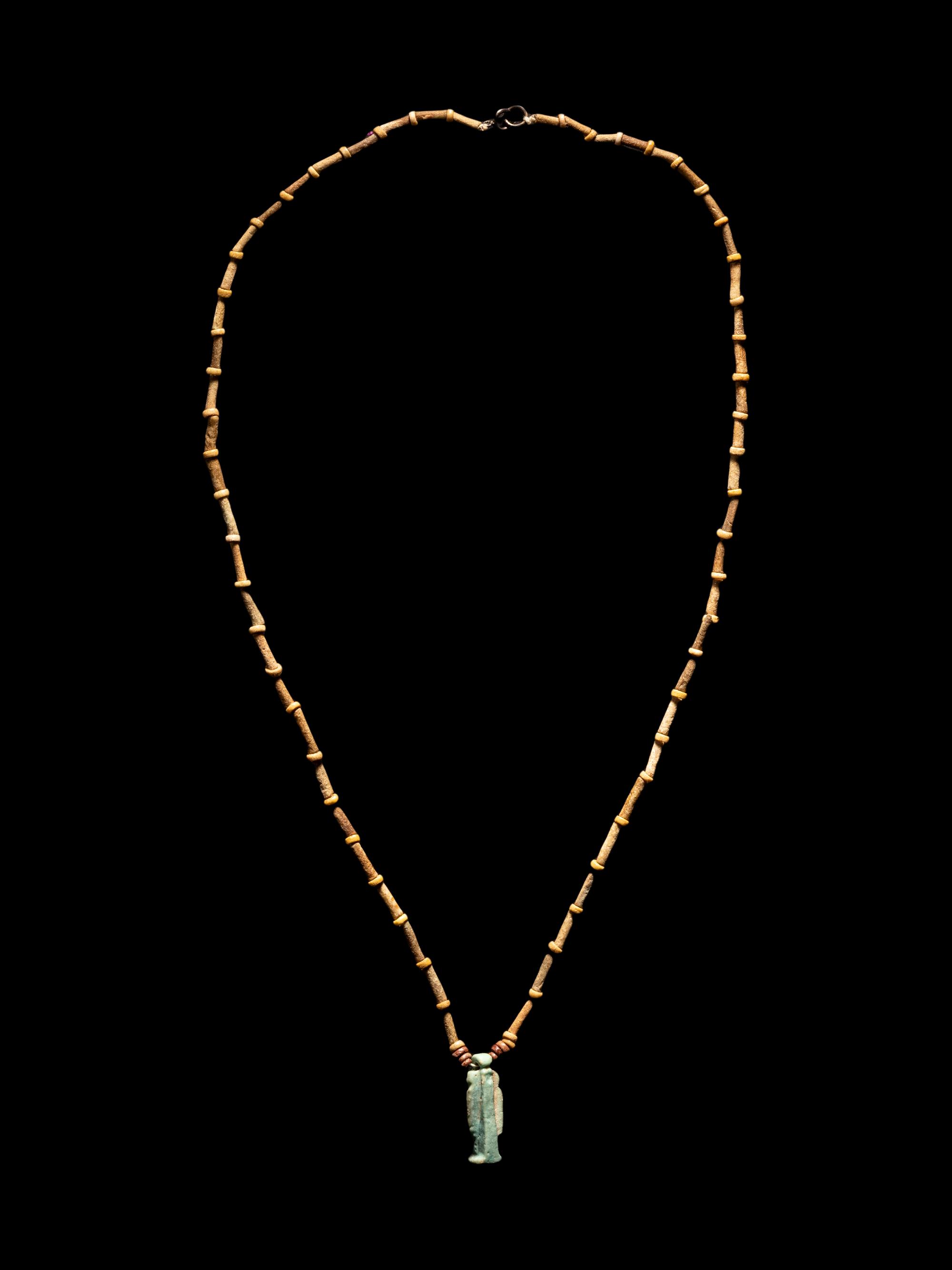 An Egyptian Bead and Faience Necklace with Khnum