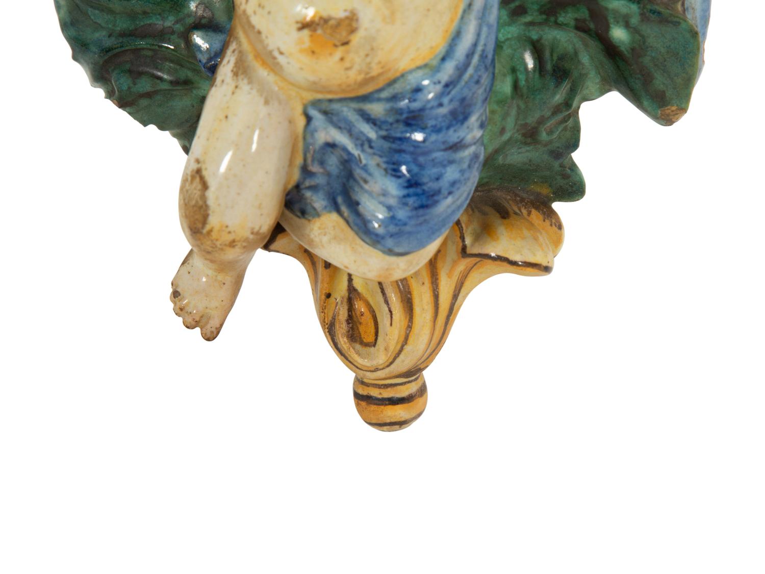 A Pair of Tin-Glazed Earthenware Wall Brackets, and Two Giltwood Wall Brackets