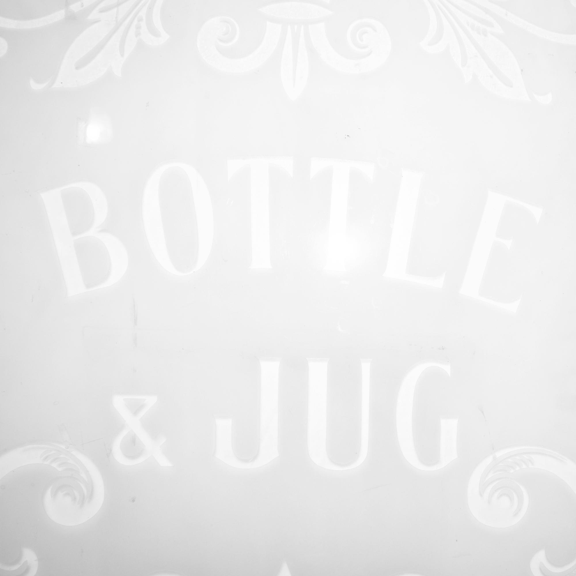 An Etched Glass Pub Window Panel 20.75" W x .25" D x 24.5" H — England, 19th Century