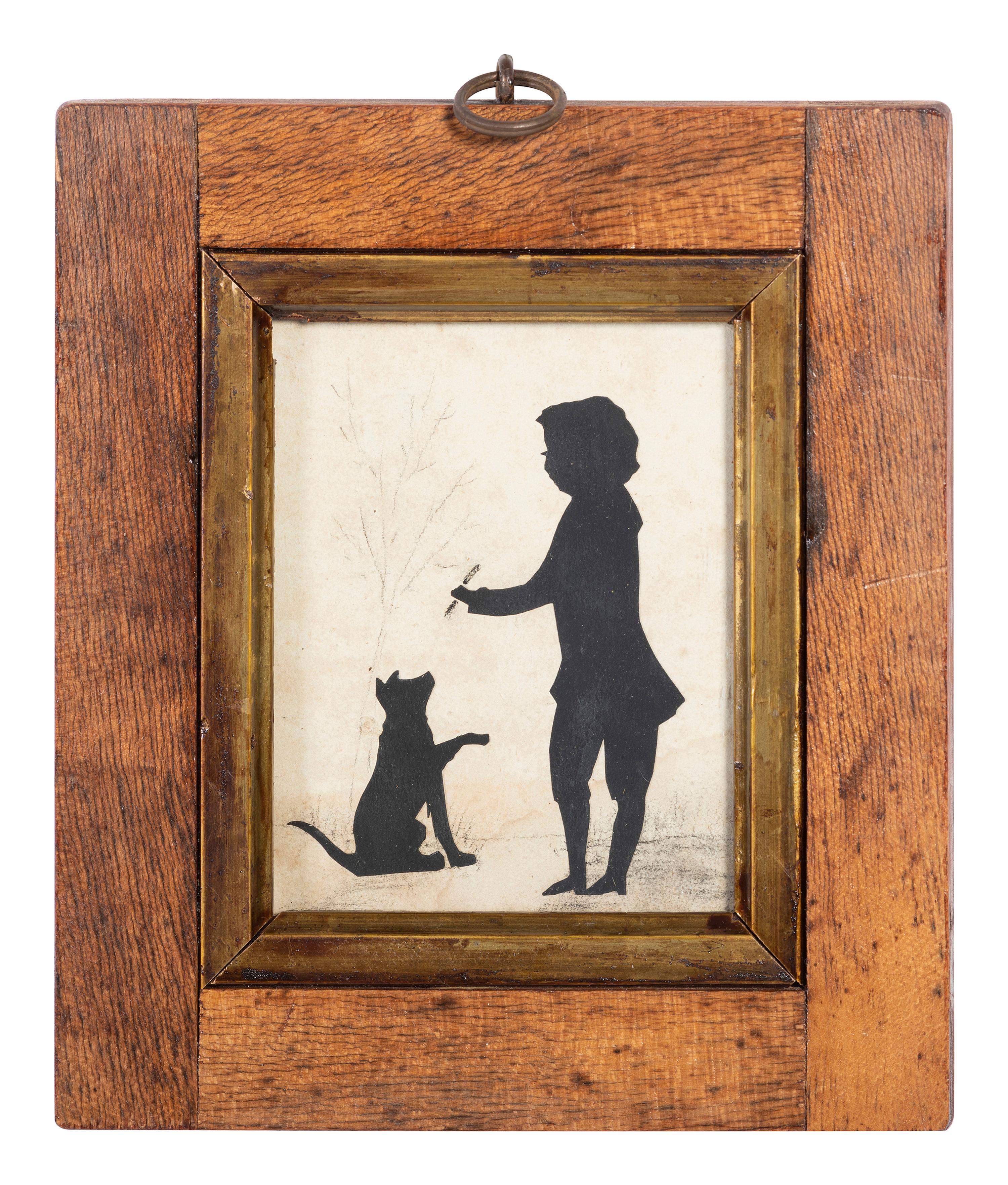 A Cut-Paper Silhouette of a Boy and Dog