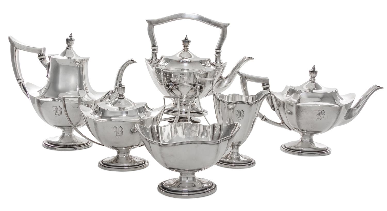 An American Silver Tea and Coffee Service, Gorham Mfg. Co., Providence, RI, comprising a kettle on lampstand, a coffee pot, a teapot, a