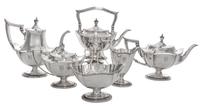 An American Silver Tea and Coffee Service, Gorham Mfg. Co., Providence, RI, comprising a kettle on lampstand, a coffee pot, a teapot, a