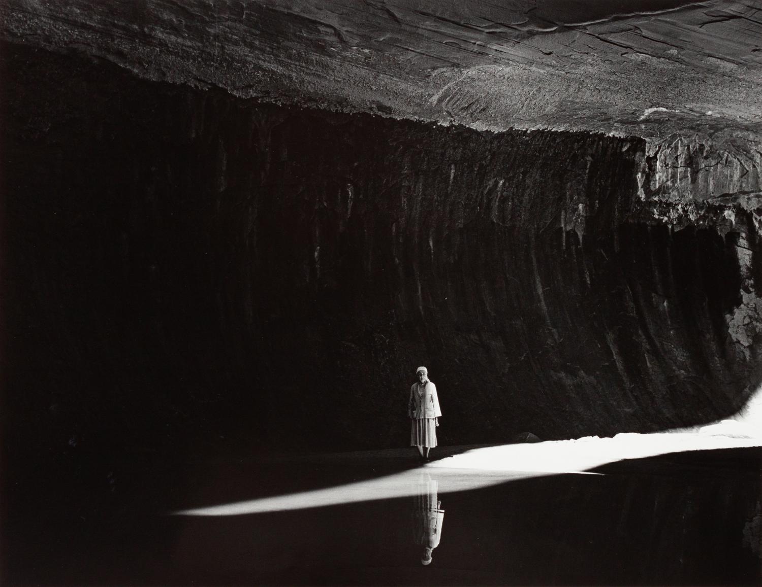 A group of five photographs ( O'Keeffe in the Canyon Under the Lake , 1964 (printed 1985); O'Keeffe Standing in Cavern , 1964 (printed 1984) Georgia O'Keeffe in Twilight Canyon , 1964 (printed 1985); Georgia O'Keeffe Photographing the Chama River , 1961 (printed 1984); O'Keeffe Sketching in Glen Canyon , 1961 (printed 1985))