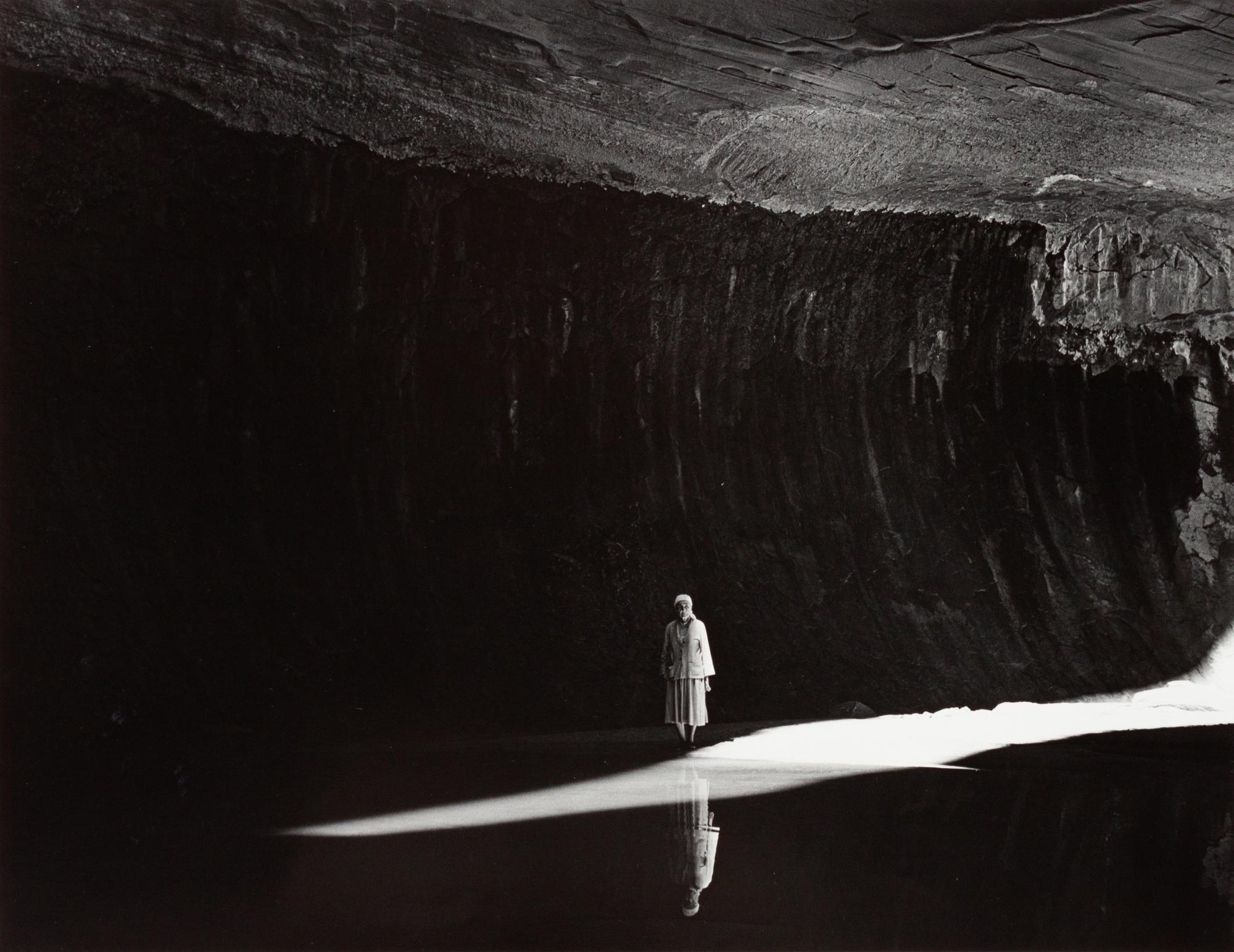 A group of five photographs ( O'Keeffe in the Canyon Under the Lake , 1964 (printed 1985); O'Keeffe Standing in Cavern , 1964 (printed 1984) Georgia O'Keeffe in Twilight Canyon , 1964 (printed 1985); Georgia O'Keeffe Photographing the Chama River , 1961 (printed 1984); O'Keeffe Sketching in Glen Canyon , 1961 (printed 1985))
