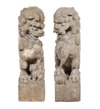 A Pair of Large Carved Stone Figures of Fu Lions