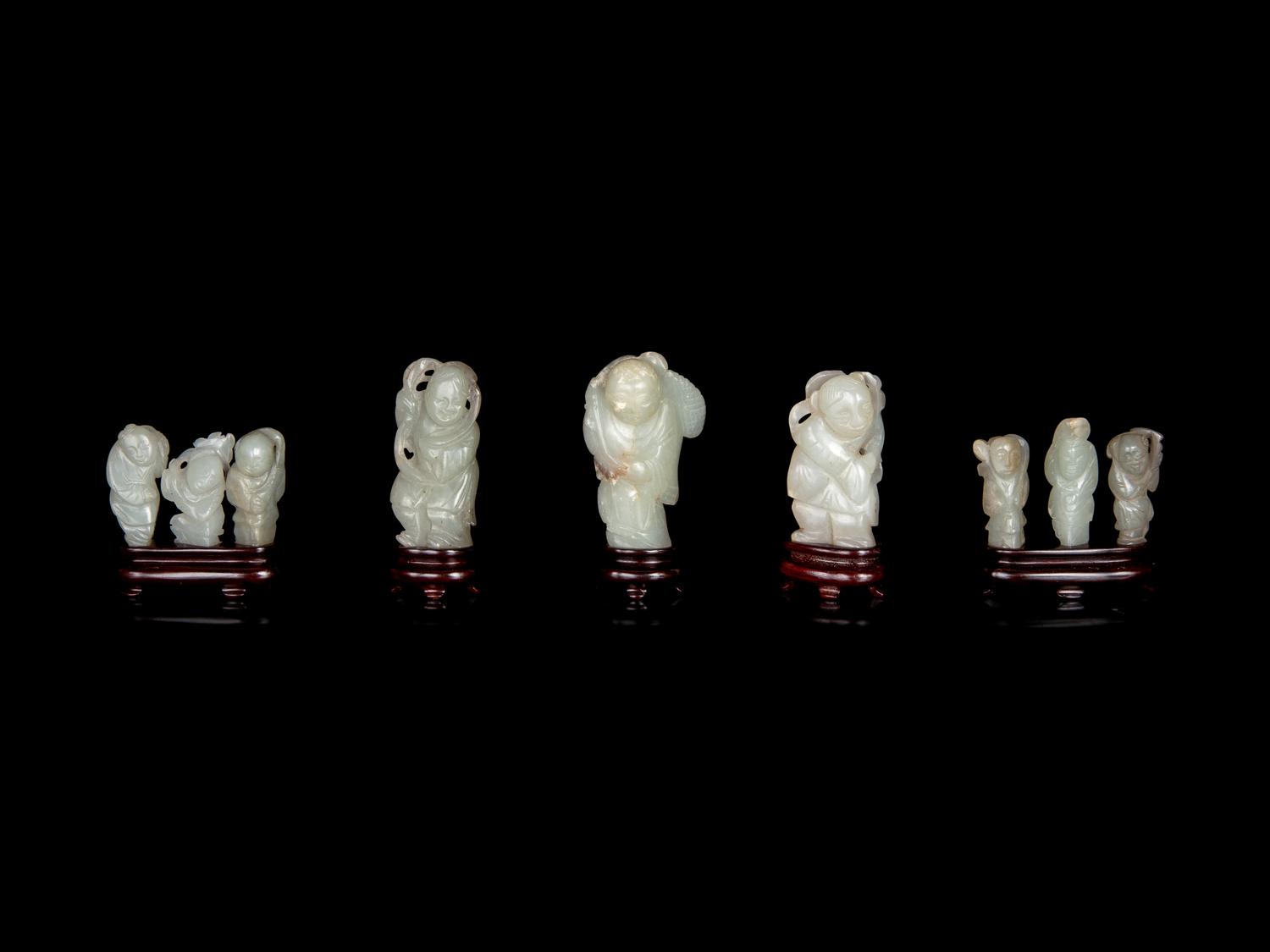 Nine Chinese Carved Celadon Jade Figures of Boys