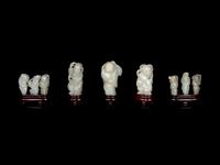 Nine Chinese Carved Celadon Jade Figures of Boys