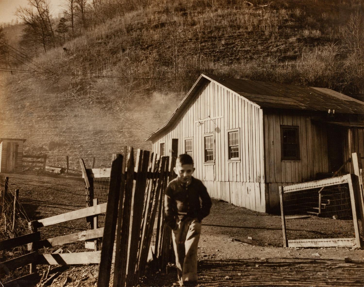 A group of four photographs ( Untitled (sleeping child) , 1950; TWU Rally Downtown , 1947; Three Forks, West Virginia, Mine School (with flag) , 1948; Mine Town School, Three Forks West Virginia (boy walking through gate) , 1948)