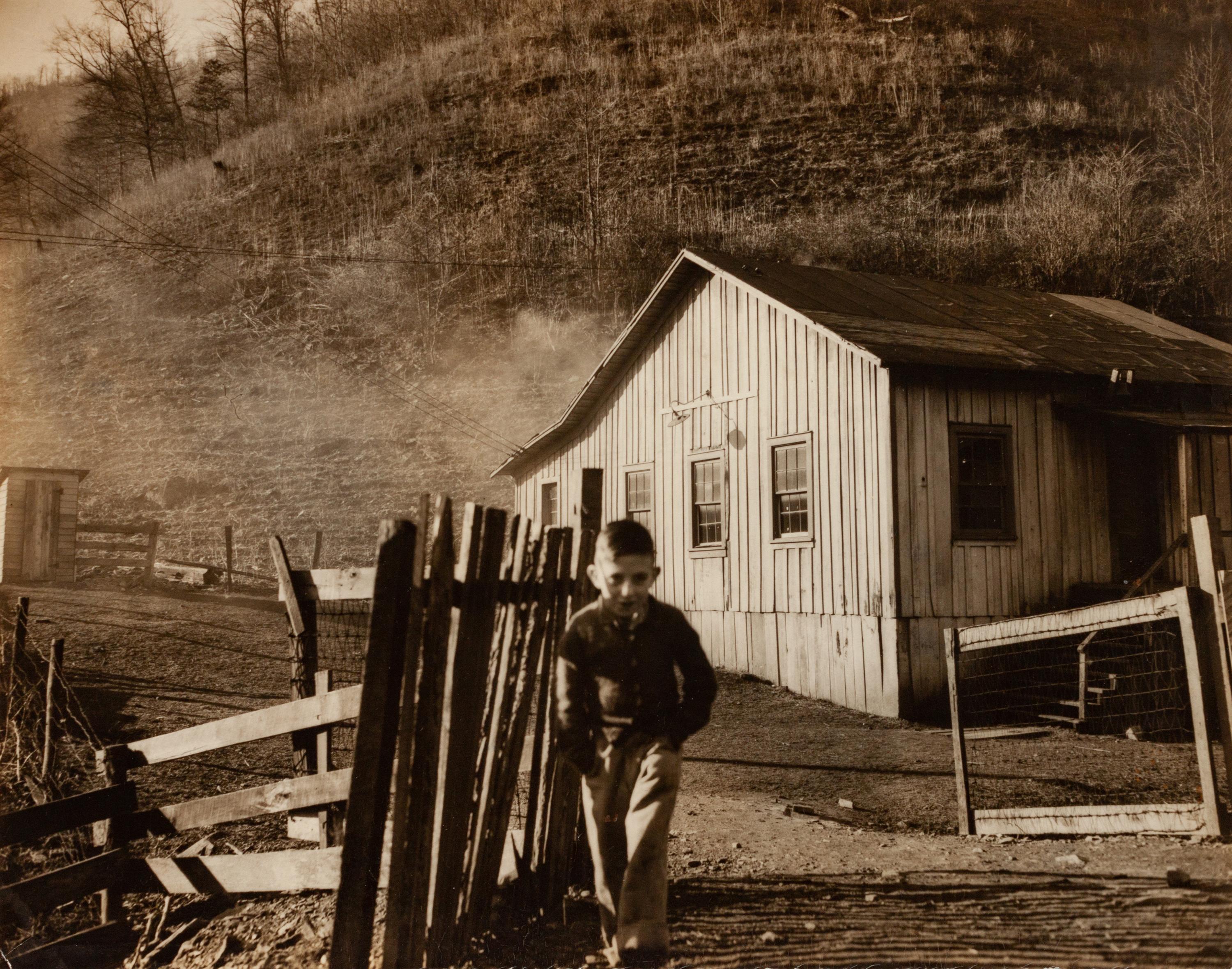 A group of four photographs ( Untitled (sleeping child) , 1950; TWU Rally Downtown , 1947; Three Forks, West Virginia, Mine School (with flag) , 1948; Mine Town School, Three Forks West Virginia (boy walking through gate) , 1948)