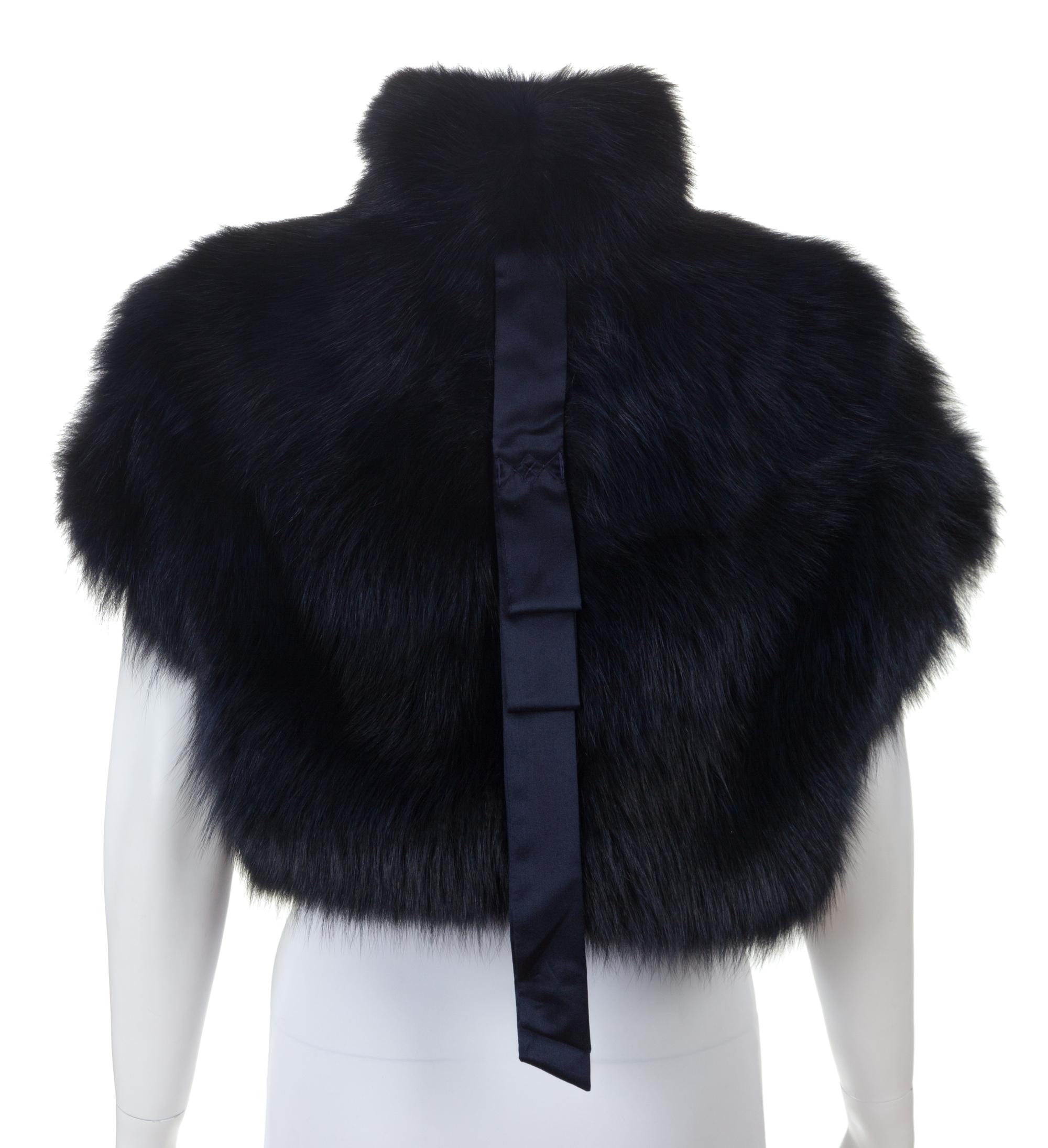 A Gucci Blue Fur Crop Vest, Size 42.