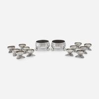 A pair of Néo-Grec sterling silver master salts and a set of twelve silver salt cellars with lily pad feet Tiffany & Co., New York, NY, 1875-1891, and other