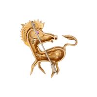 CARTIER, YELLOW GOLD AND RUBY ZEBRA BROOCH