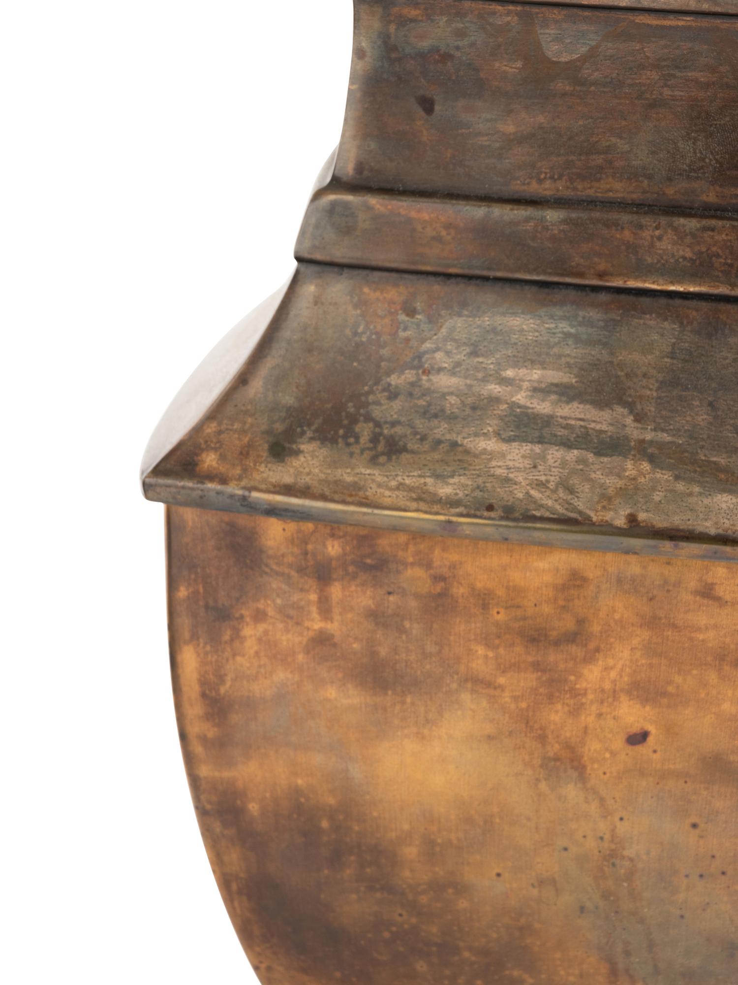 A Pair of Patinated Lamps