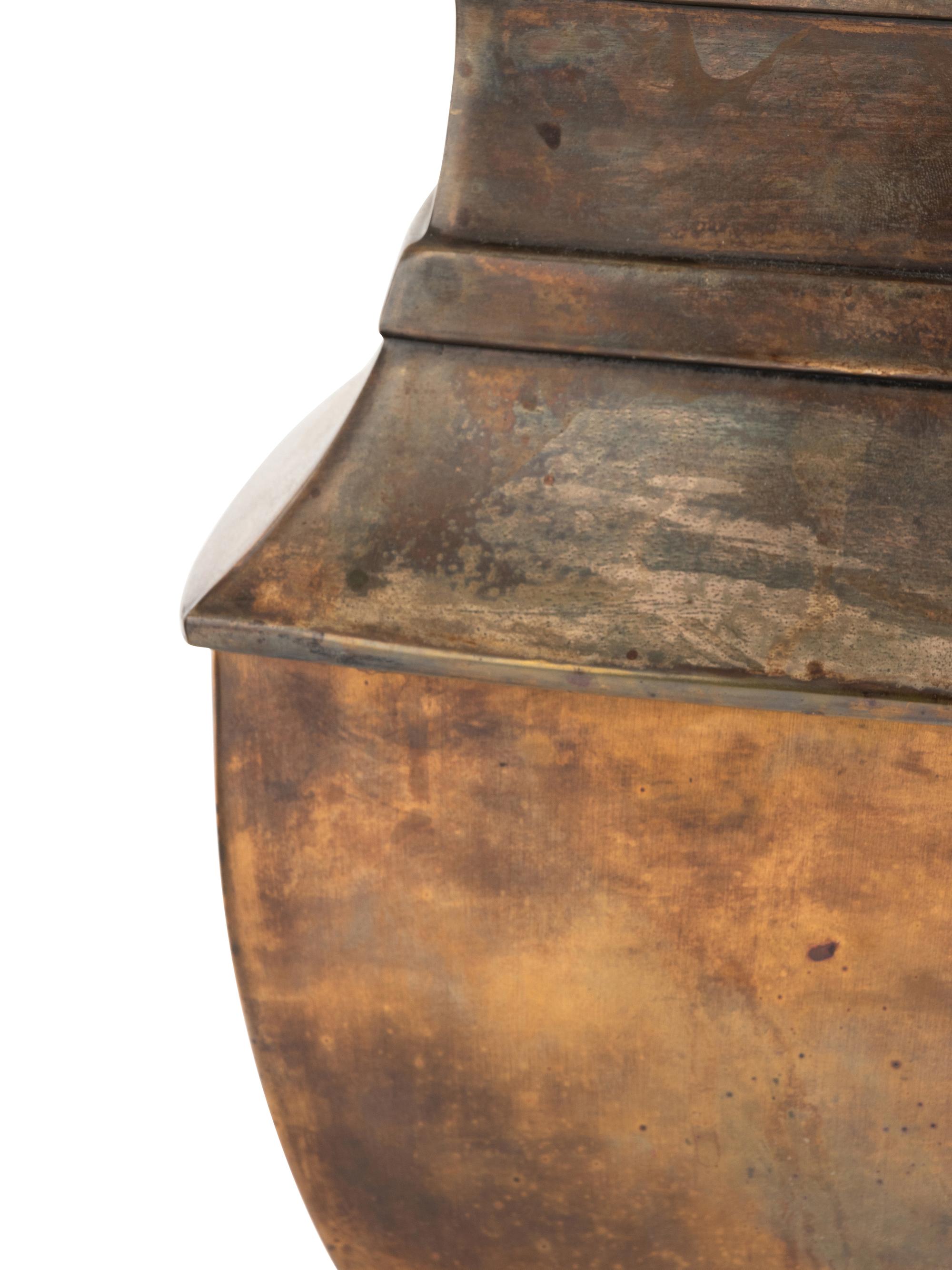 A Pair of Patinated Lamps
