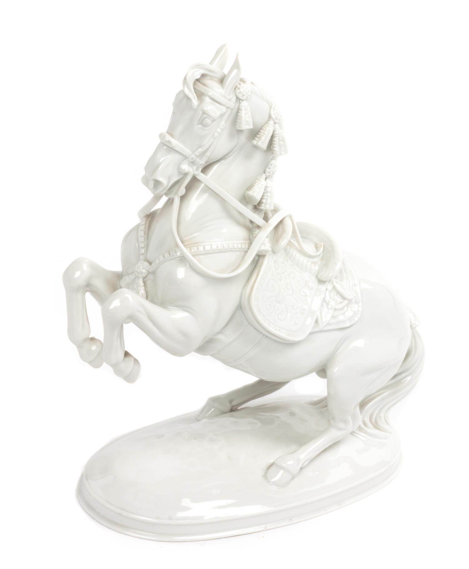 An Austrian Blanc de Chine Porcelain Figure Width 8 inches. — 20TH CENTURY