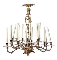 A Louis XV Style Gilt Bronze Eighteen-Light Chandelier, Height 34 x diameter 33 inches.