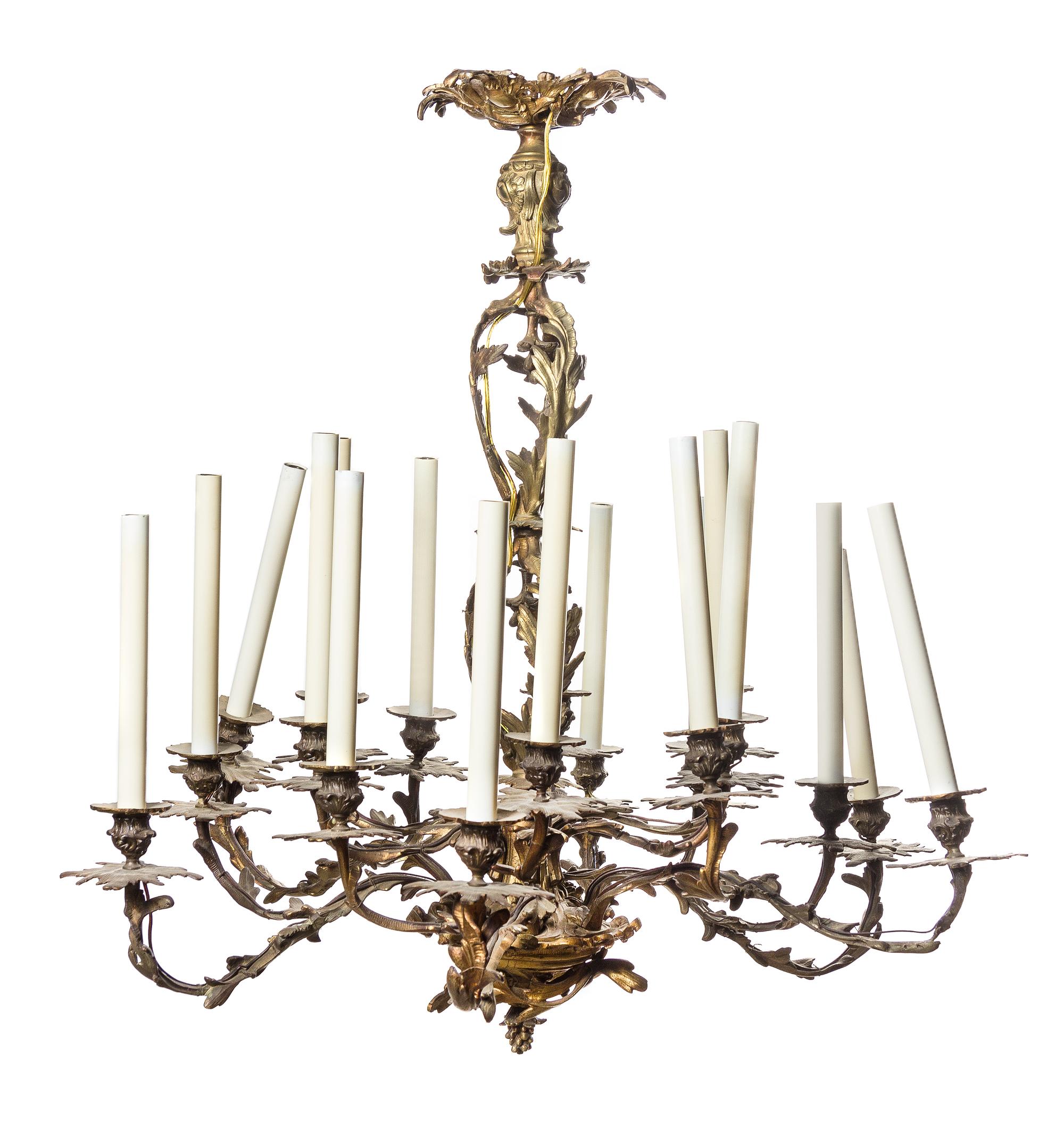 A Louis XV Style Gilt Bronze Eighteen-Light Chandelier, Height 34 x diameter 33 inches.